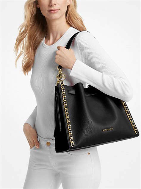 michael kors bag with chain strap|mina large chain shoulder bag.